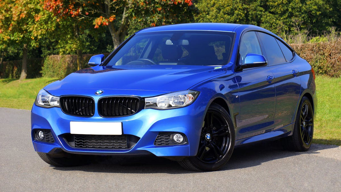 Voiture bleue sur route - rever voiture | Source Sacree