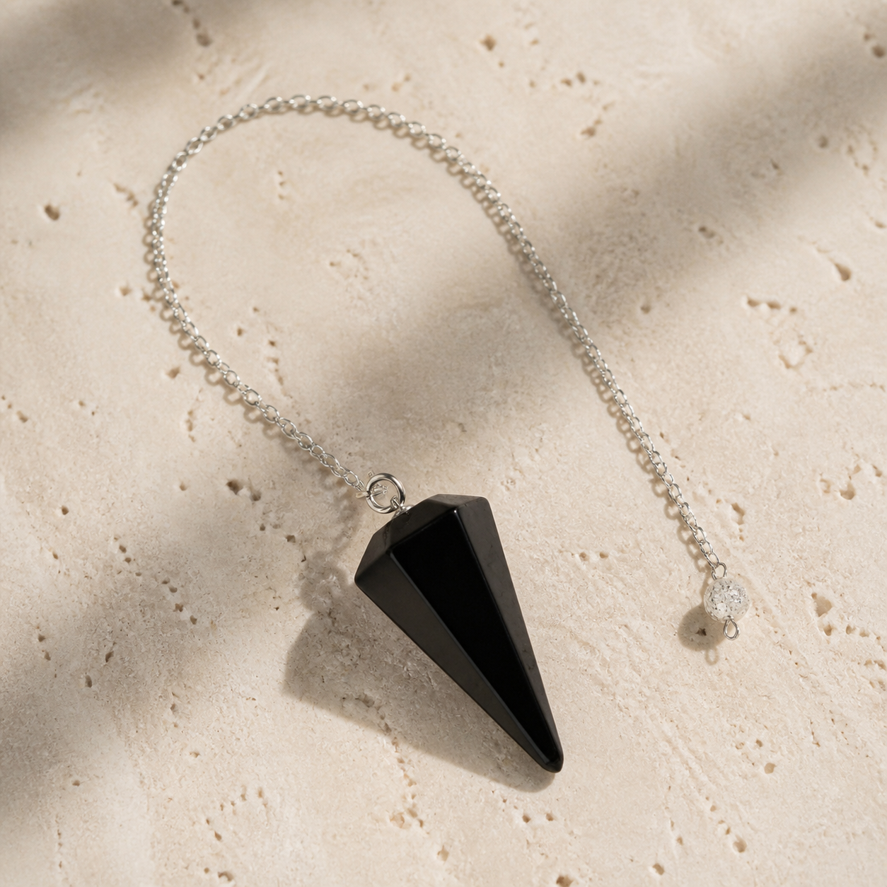 Pendule Radiesthesie - Agate Noire — photographie produit premium
