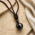 Collier Homme Obsidienne Noire — Pierre 16 mm sur Cordon Tressé — photographie produit premium