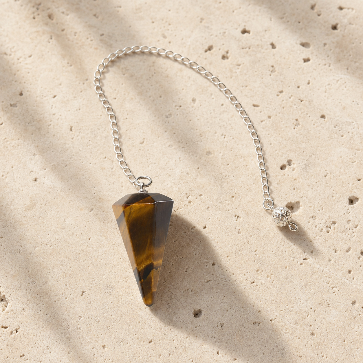 Pendule Radiesthesie - Oeil de Tigre — photographie produit premium