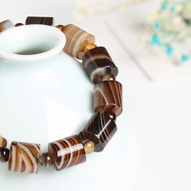 Bracelet agate dentelle 12 mm teinte café, tubes rubanés et œil de tigre