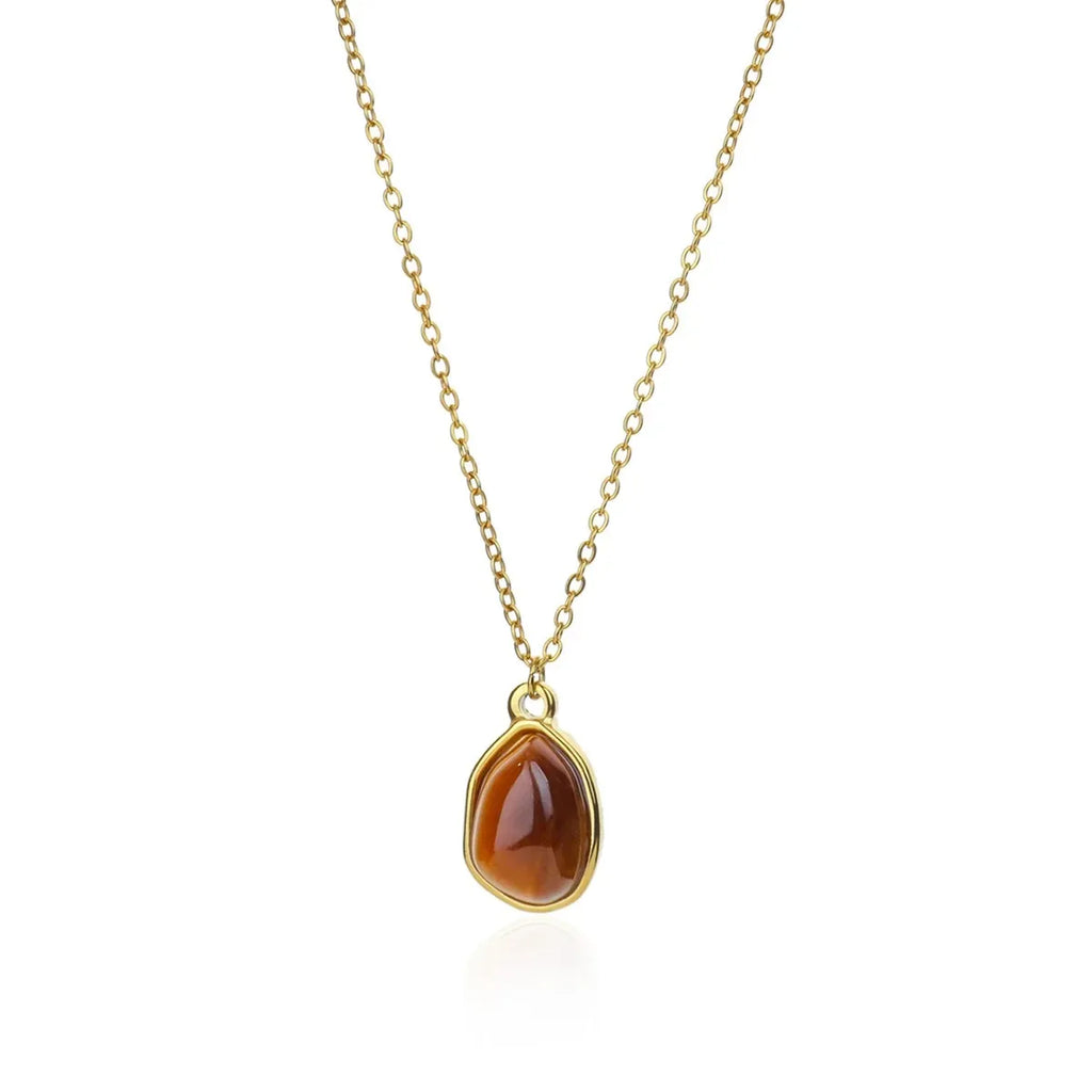 Collier pendentif agate brune zonée sertie de doré