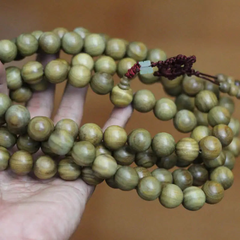 Perle de tête et nœud macramé tressé du mala en santal vert